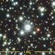 A star-speckled region of space with a particularly bright object in the center.
